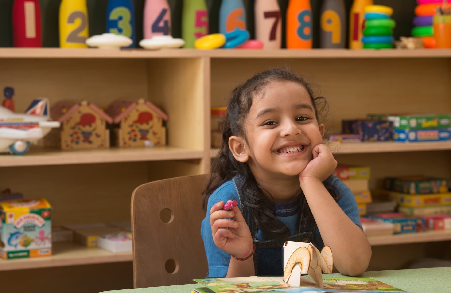 A child enjoying a hands-on creative activity